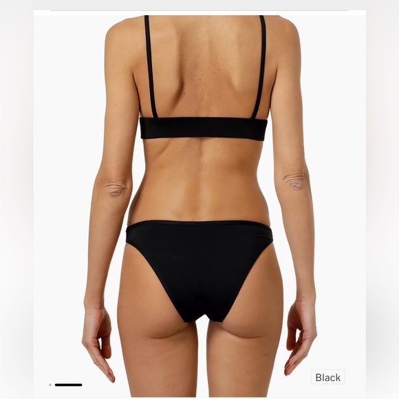 Balmain's triangle bikini top showcases a stretchy underbust with logo detail. - Picture 2 of 3